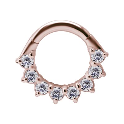 Anneau clicker en rose 18k avec des pierres griffées Anneau clicker en rose 18k avec des pierres griffées